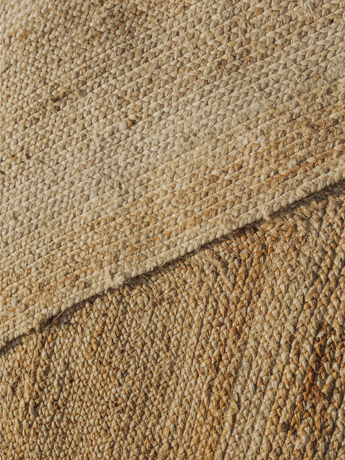 Close-up of a 5x8 jute rug showcasing its handwoven texture and natural fiber construction for a rustic yet elegant look.