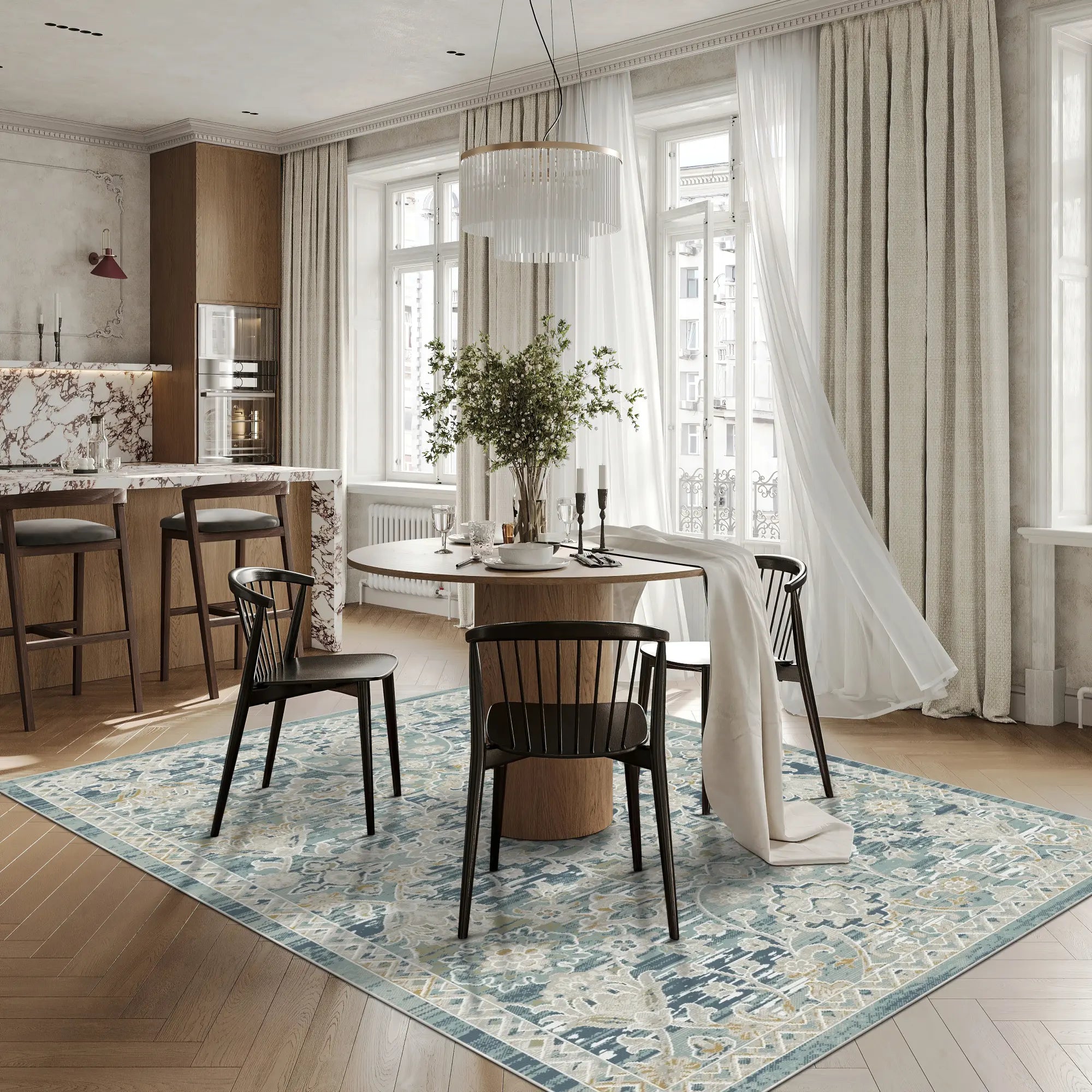 Blue area rug with distressed trellis pattern in beige and gray tones under dining table