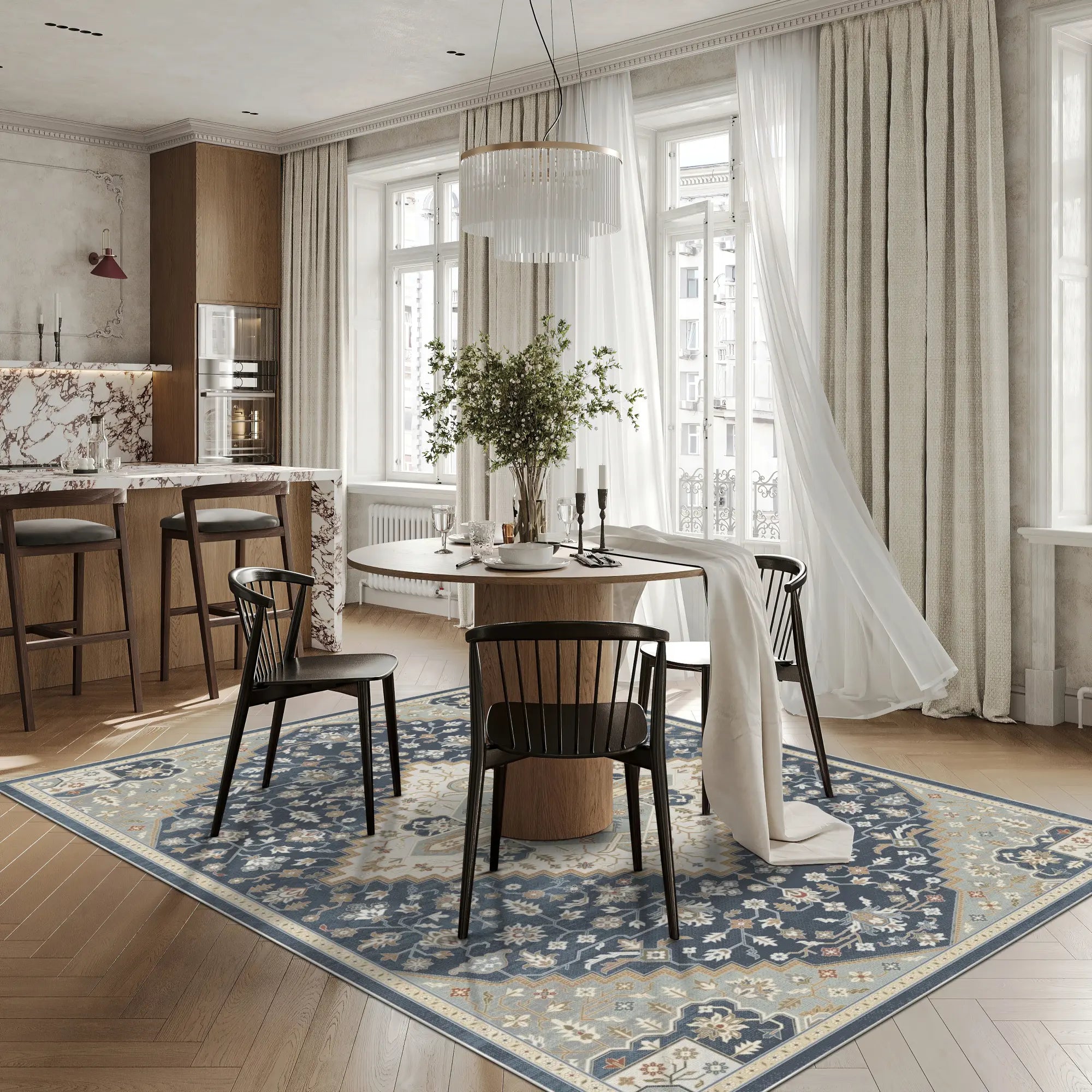 blue and beige area rug with medallion and floral patterns in dining room setting