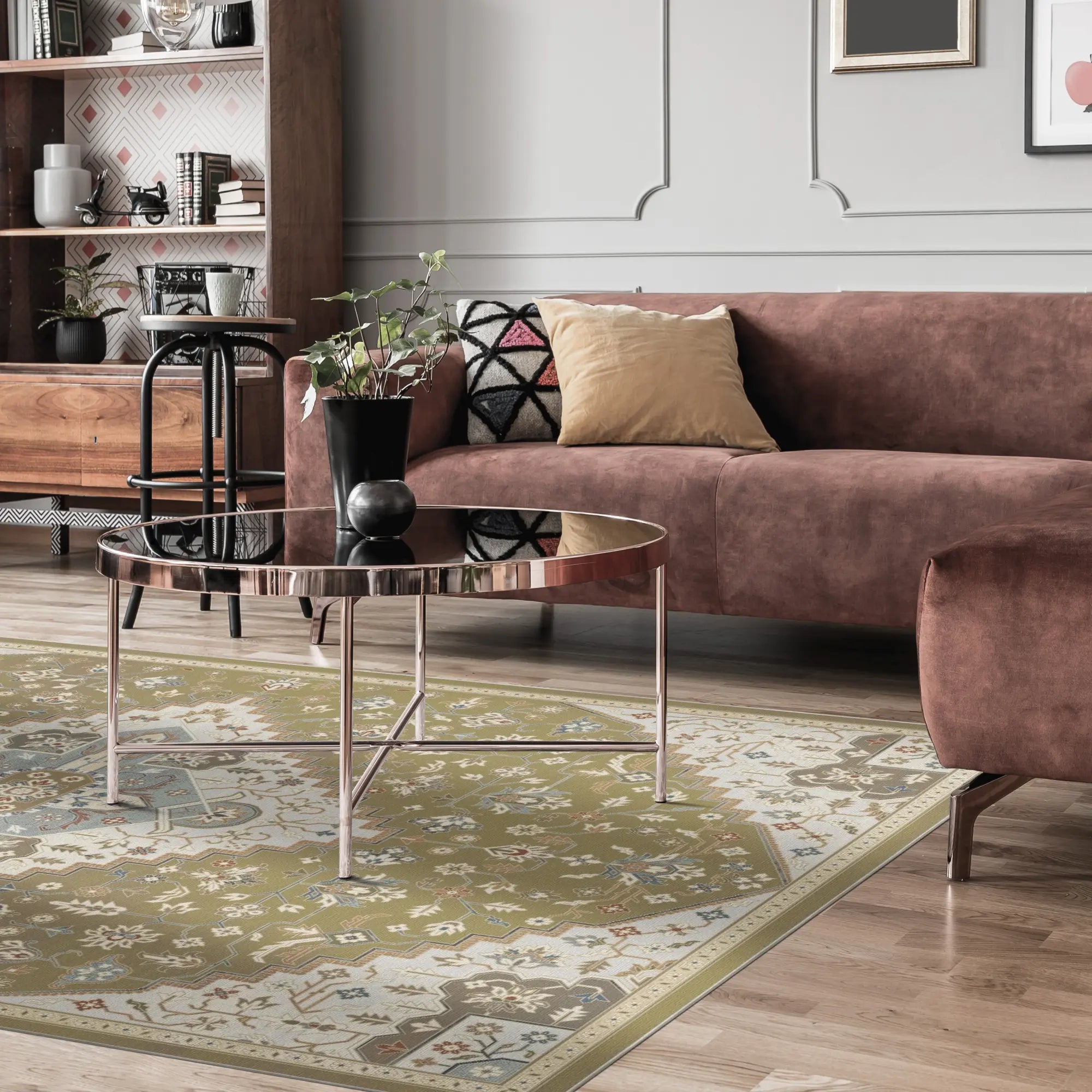 area rug with olive green, beige, and blue medallion pattern in living room setting