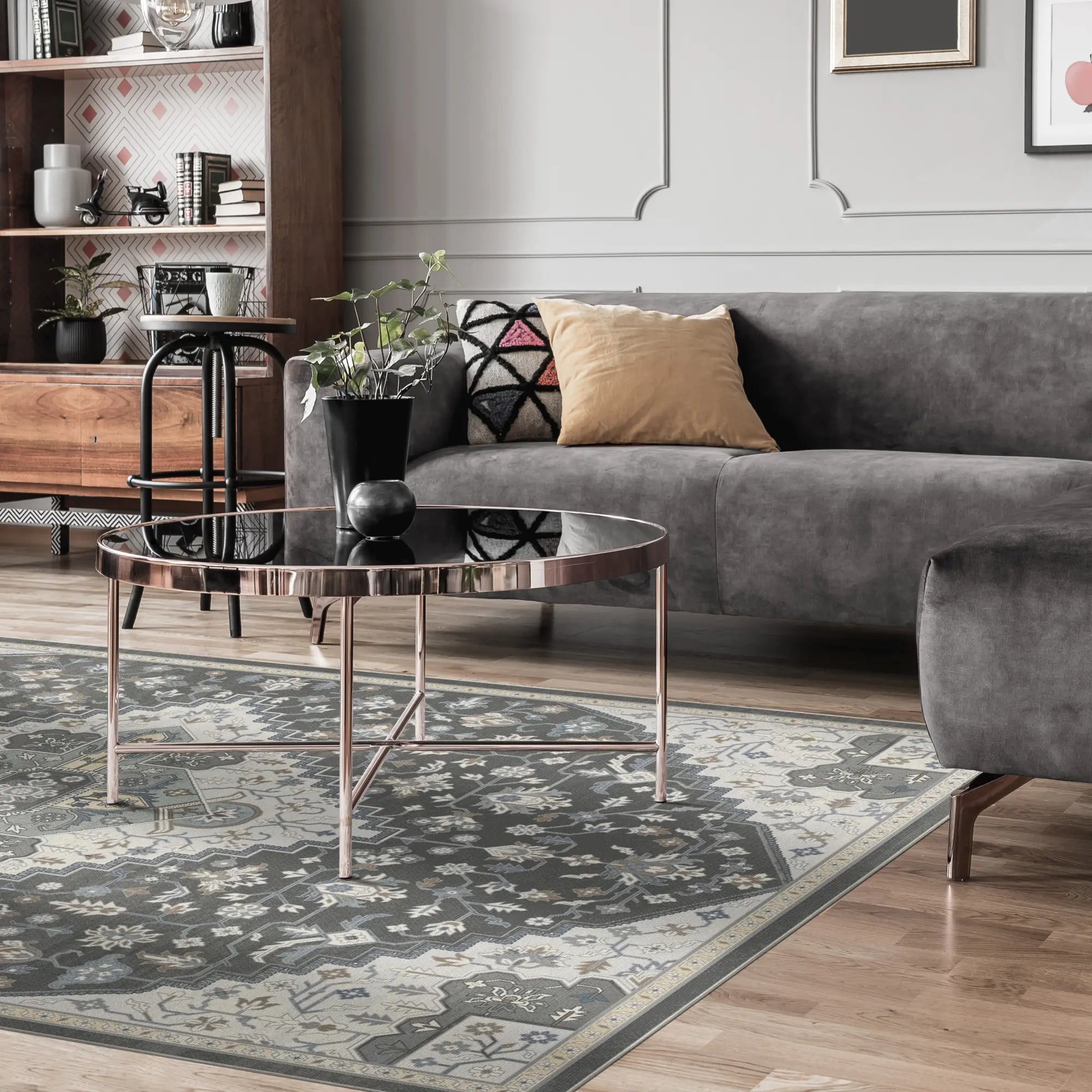 gray area rug with medallion and floral patterns in living room setting