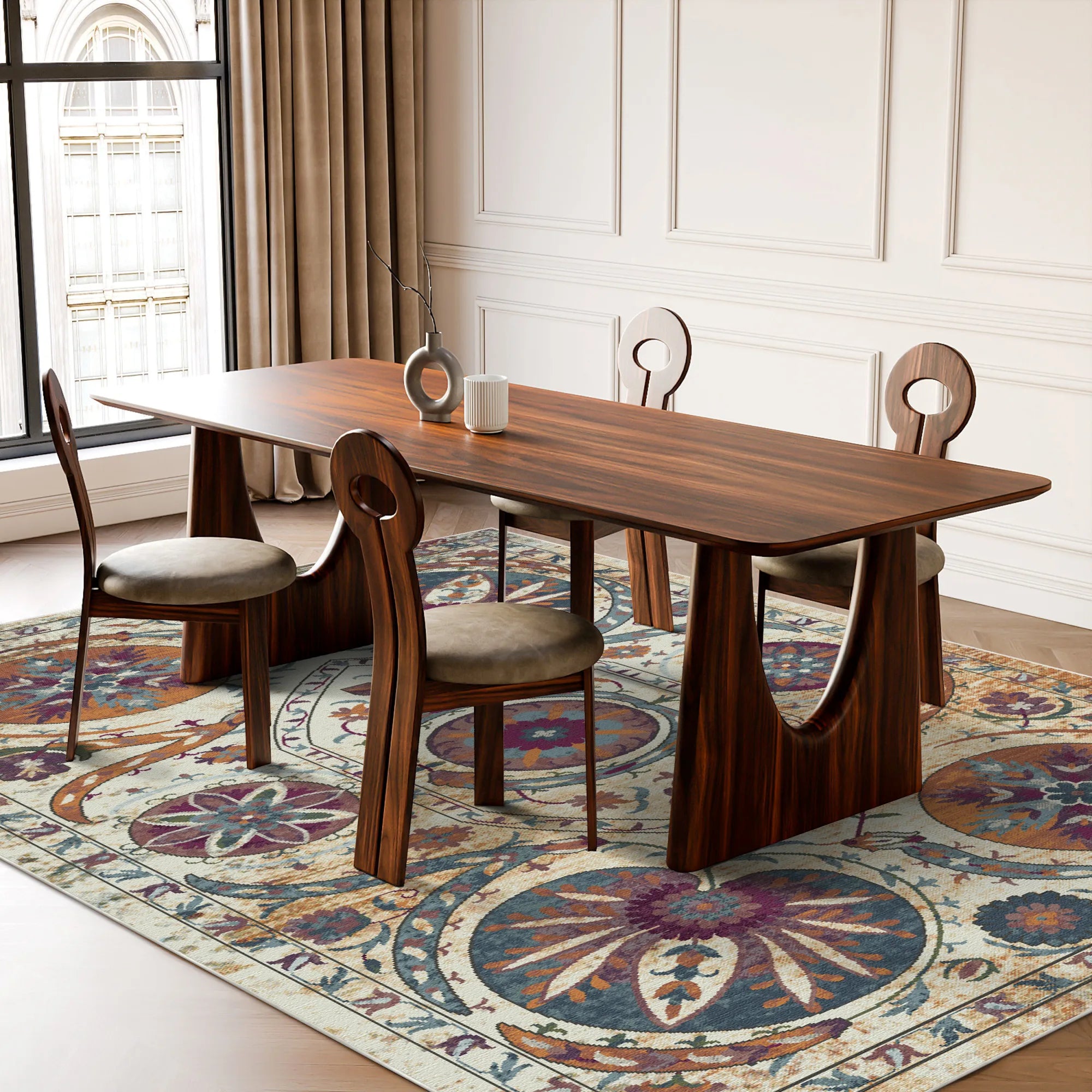 area rug with amber, blue, and purple medallion pattern under wooden dining table and chairs