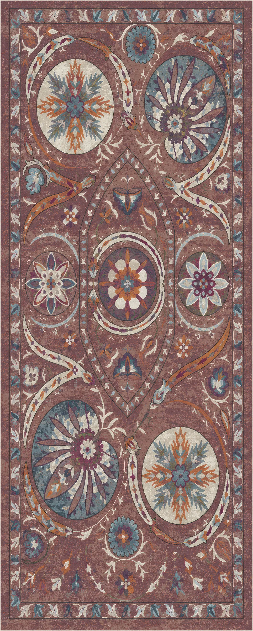 An ornate traditional area rug with a complex medallion and floral pattern in earthy brown, dusty blue, cream, and rust orange tones.