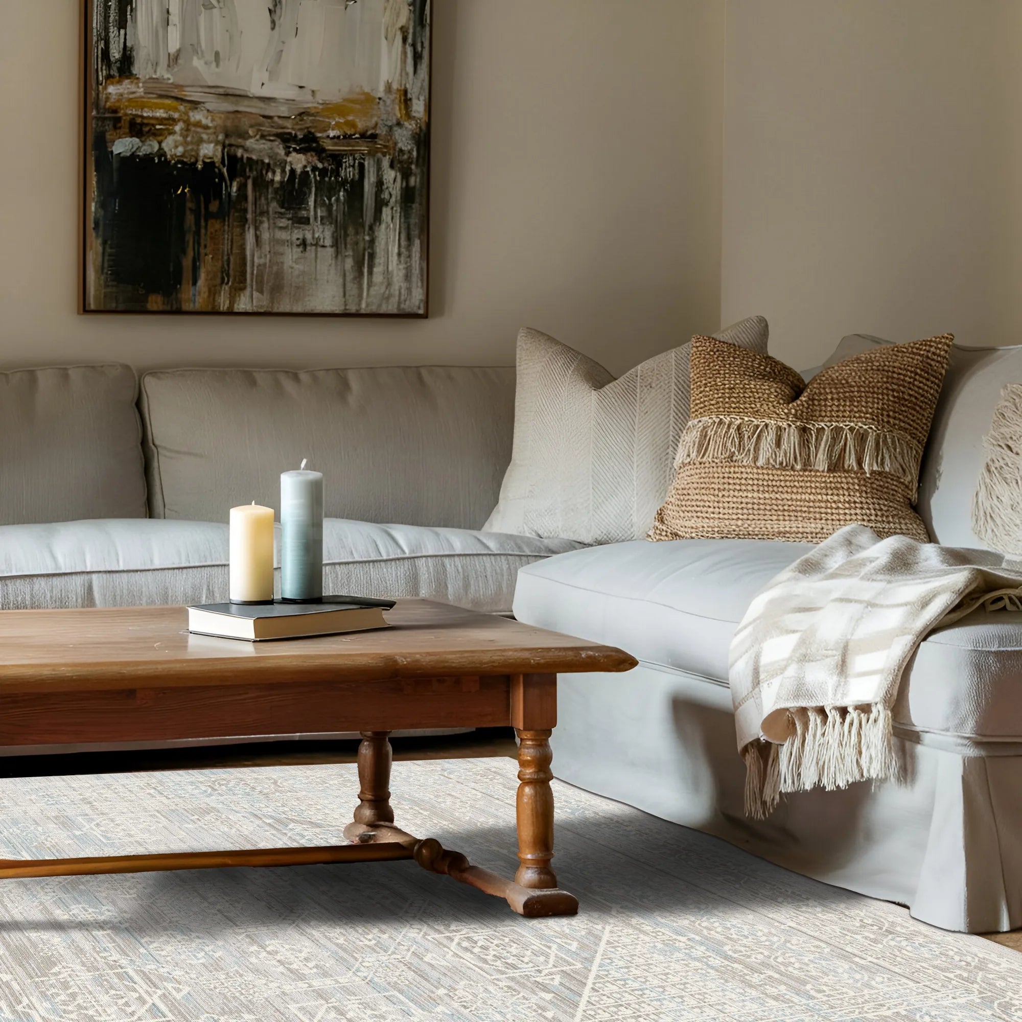 light blue and beige area rug with subtle geometric pattern under wooden coffee table in living room