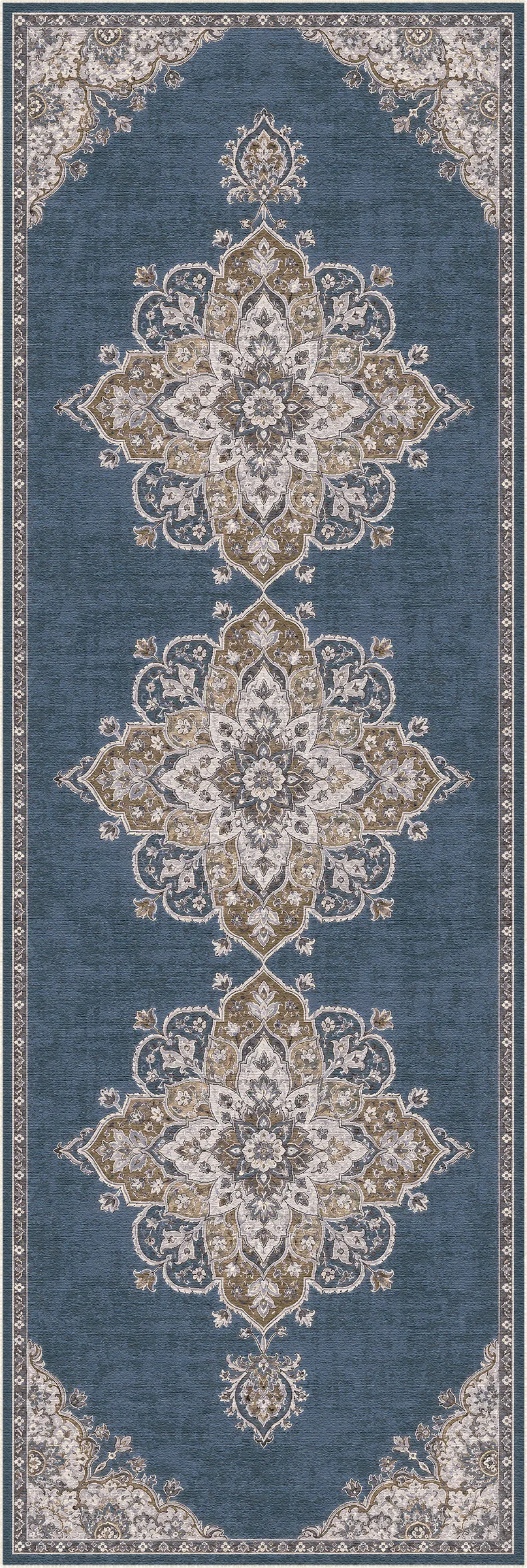 A rectangular area rug with a traditional ornamental medallion pattern in slate blue, beige, and white, shown flat against a white background.