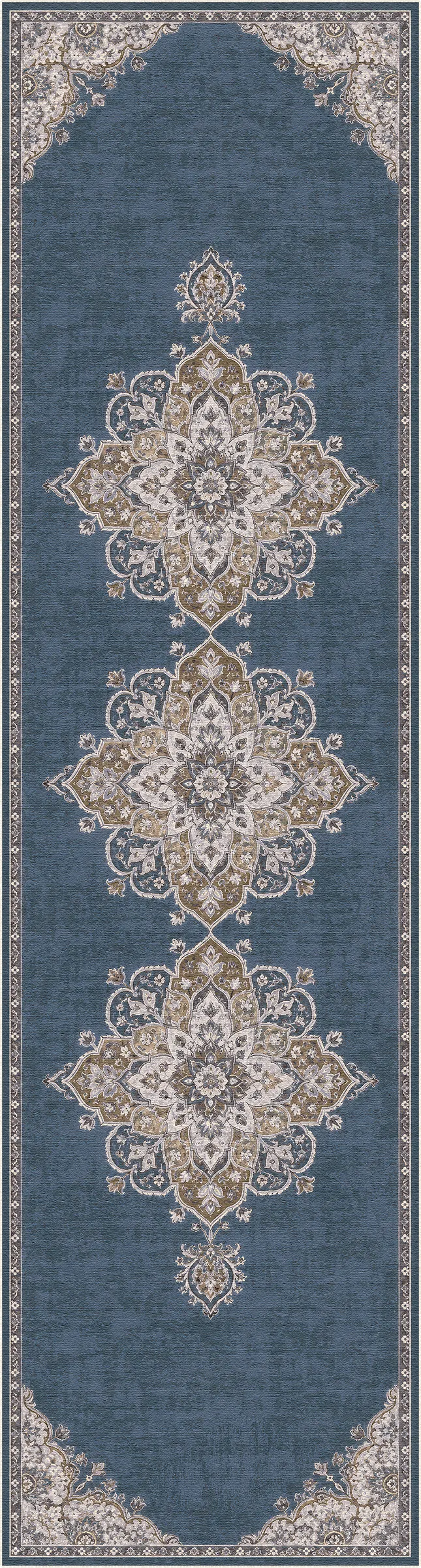 A long rectangular area rug with a blue field and ornate beige and white floral medallions, shown flat against a white background.