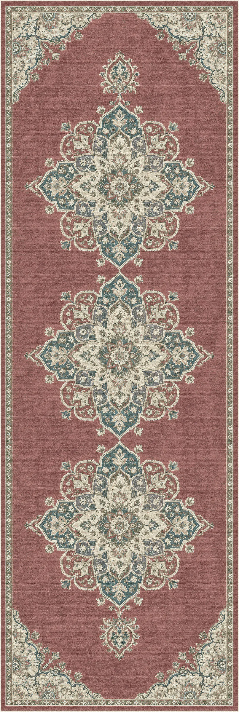 A rectangular area rug with a traditional Persian-style pattern, featuring a dusty rose background with three large central medallions in cream and teal, and a matching border.