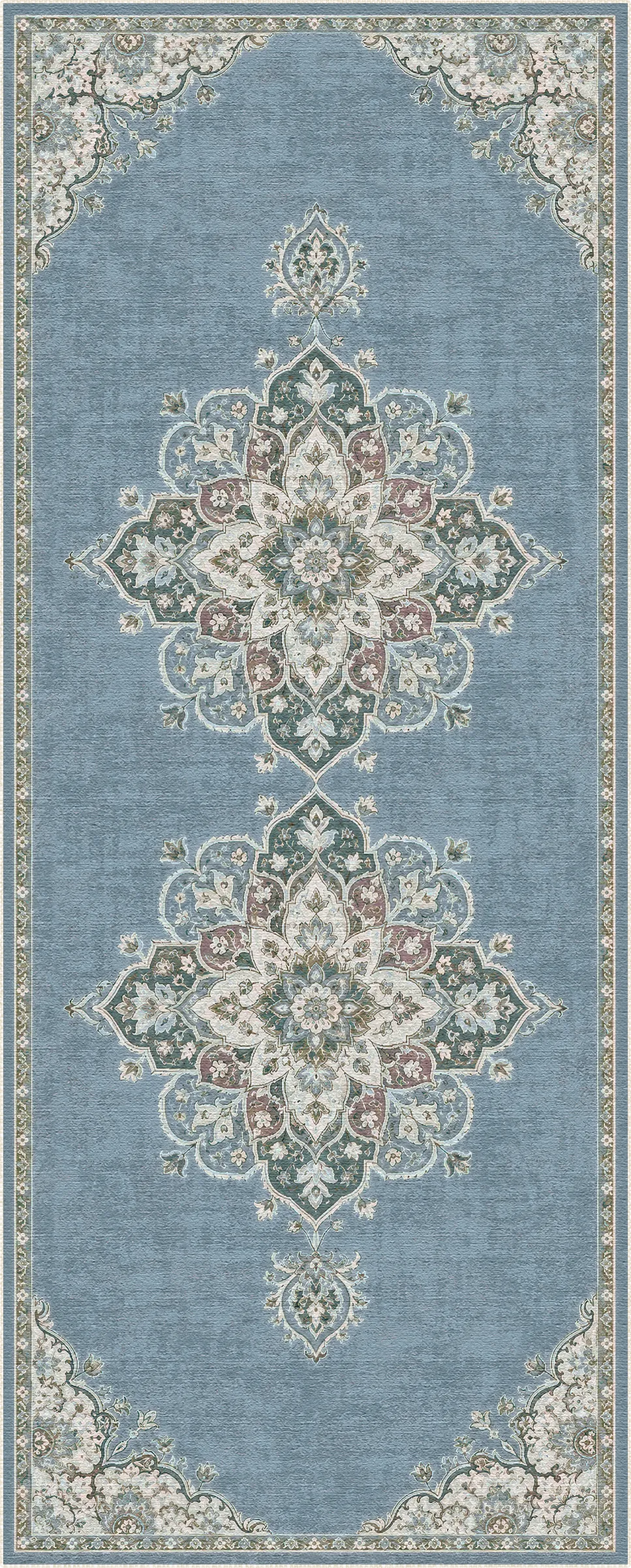 A rectangular area rug with a traditional medallion pattern in dusty blue, cream, sage green, and muted pink, shown flat against a white background.