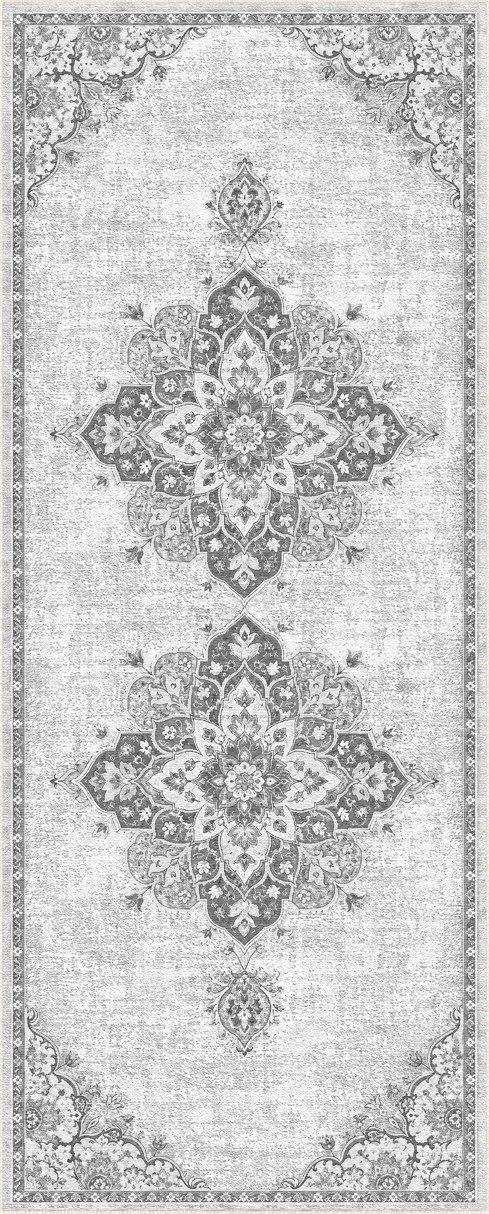 A rectangular area rug with a distressed, vintage-style traditional pattern in shades of gray, beige, and off-white.