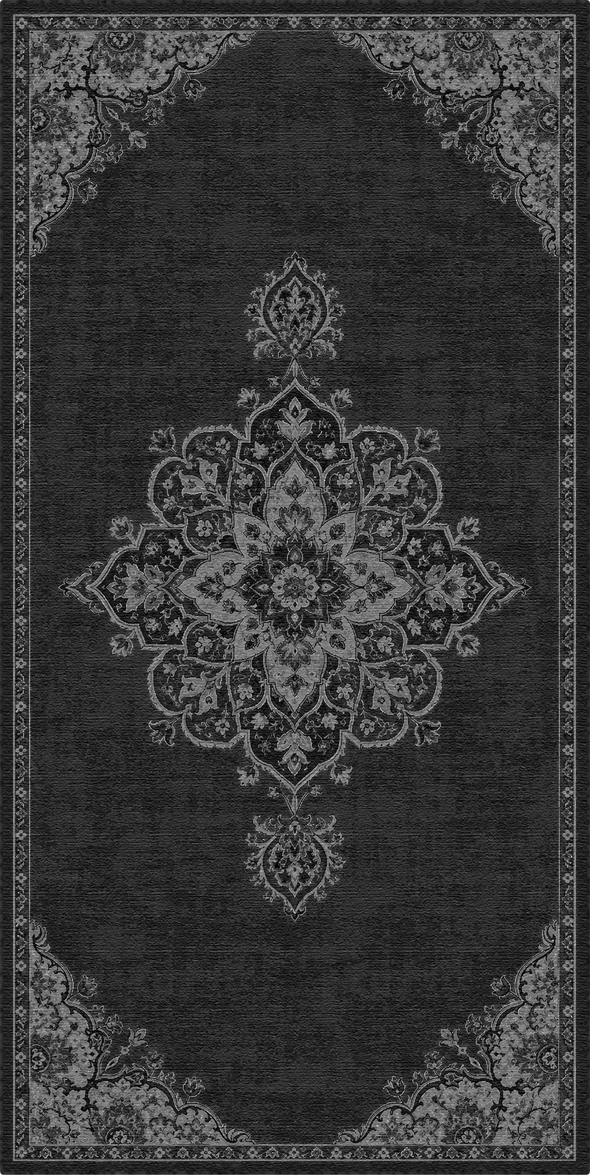 A dark charcoal gray area rug with a distressed, vintage-style traditional medallion pattern in light gray and off-white.