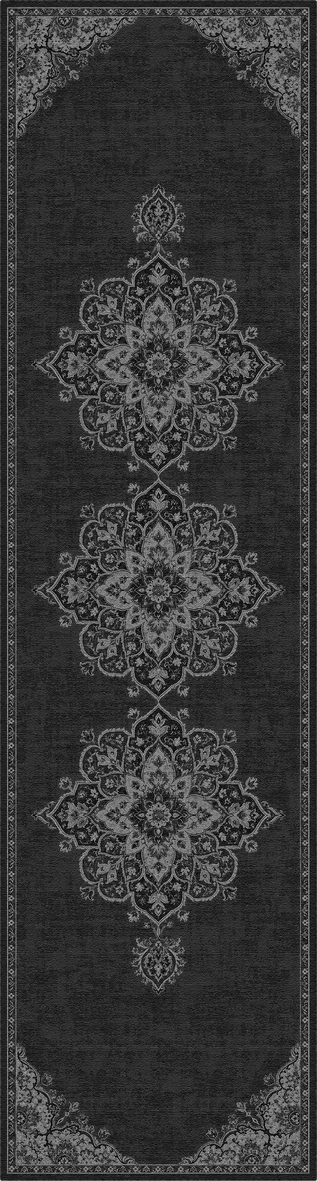 A dark charcoal gray area rug with a traditional ornate medallion pattern in light gray and white, shown flat against a white background.