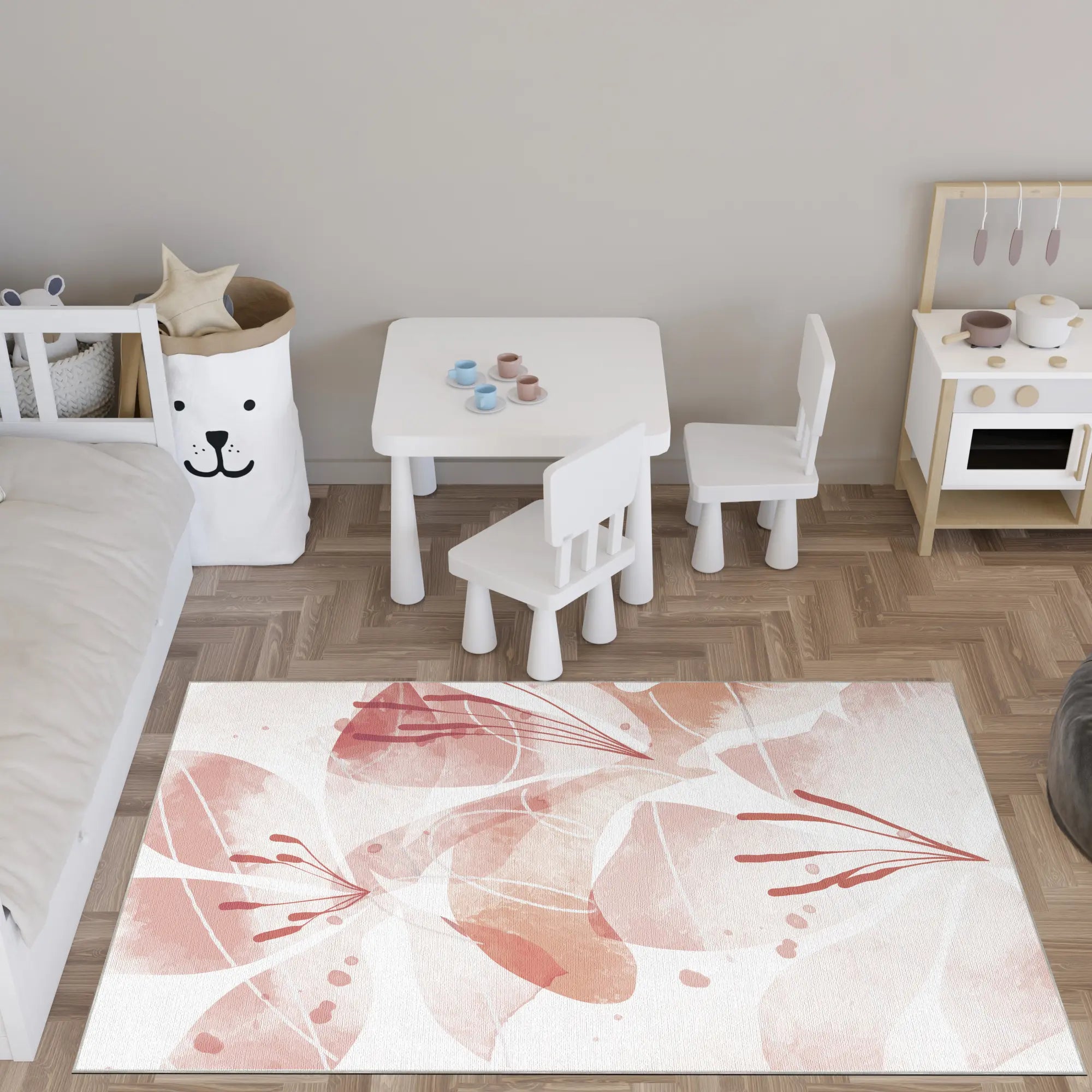Children's playroom with a floral rug, table, and chairs on a wooden floor.