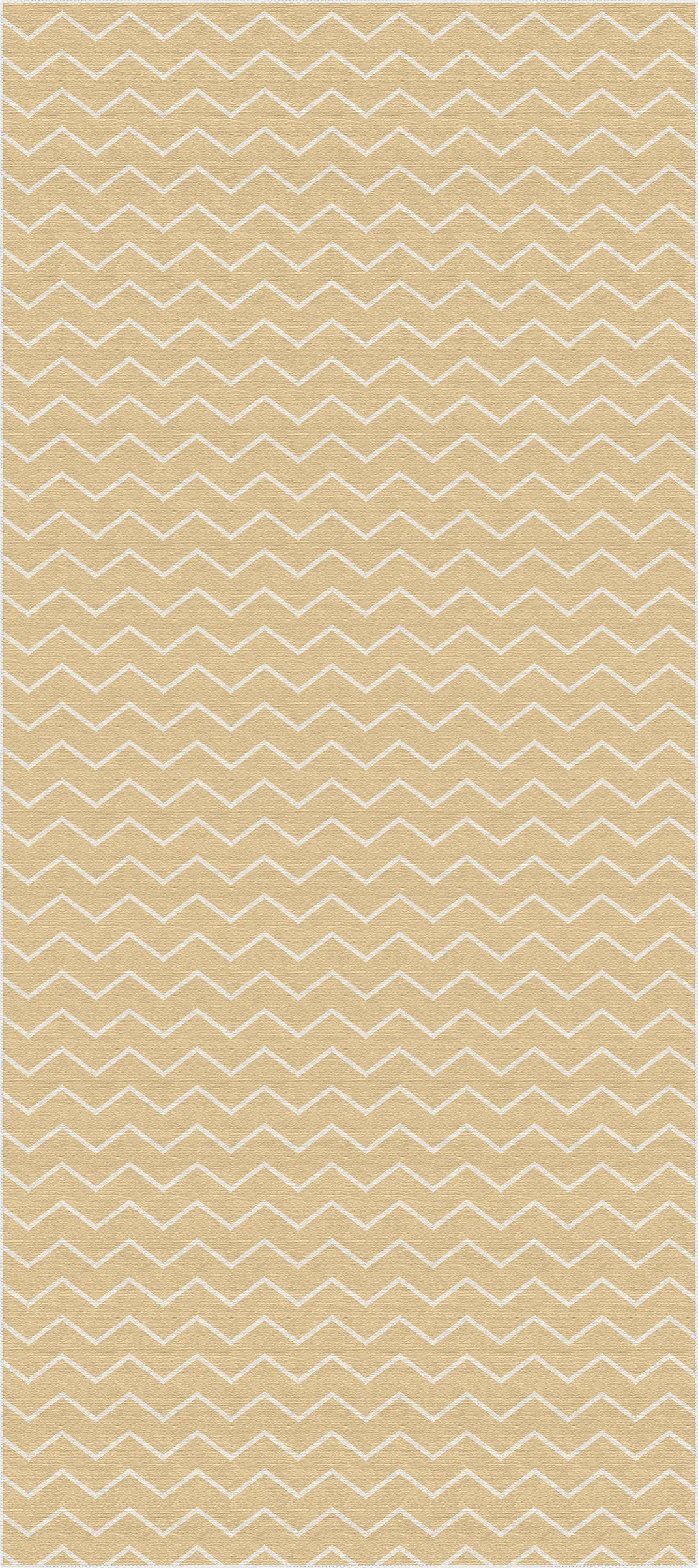 Beige area rug with white chevron pattern in a flat weave texture