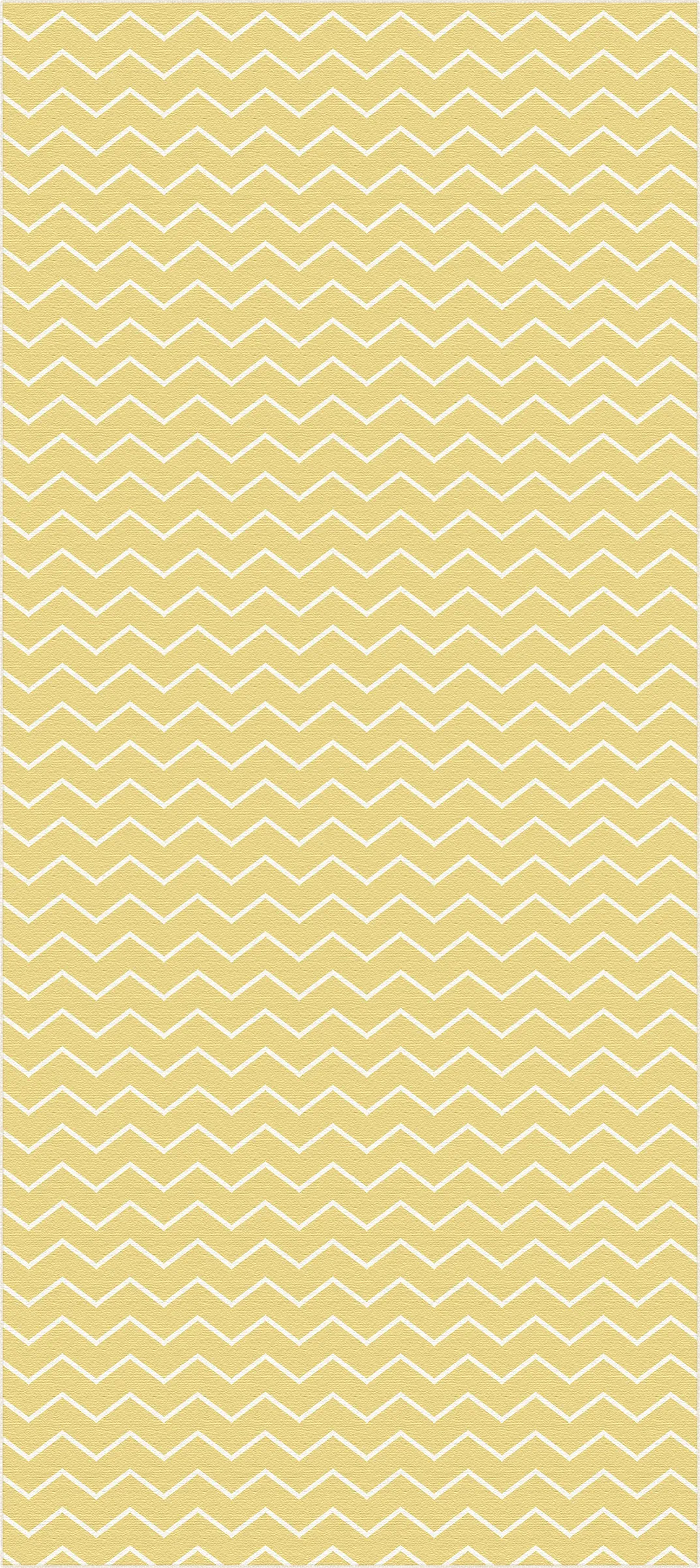 Pale yellow area rug with white chevron zigzag pattern and textured surface
