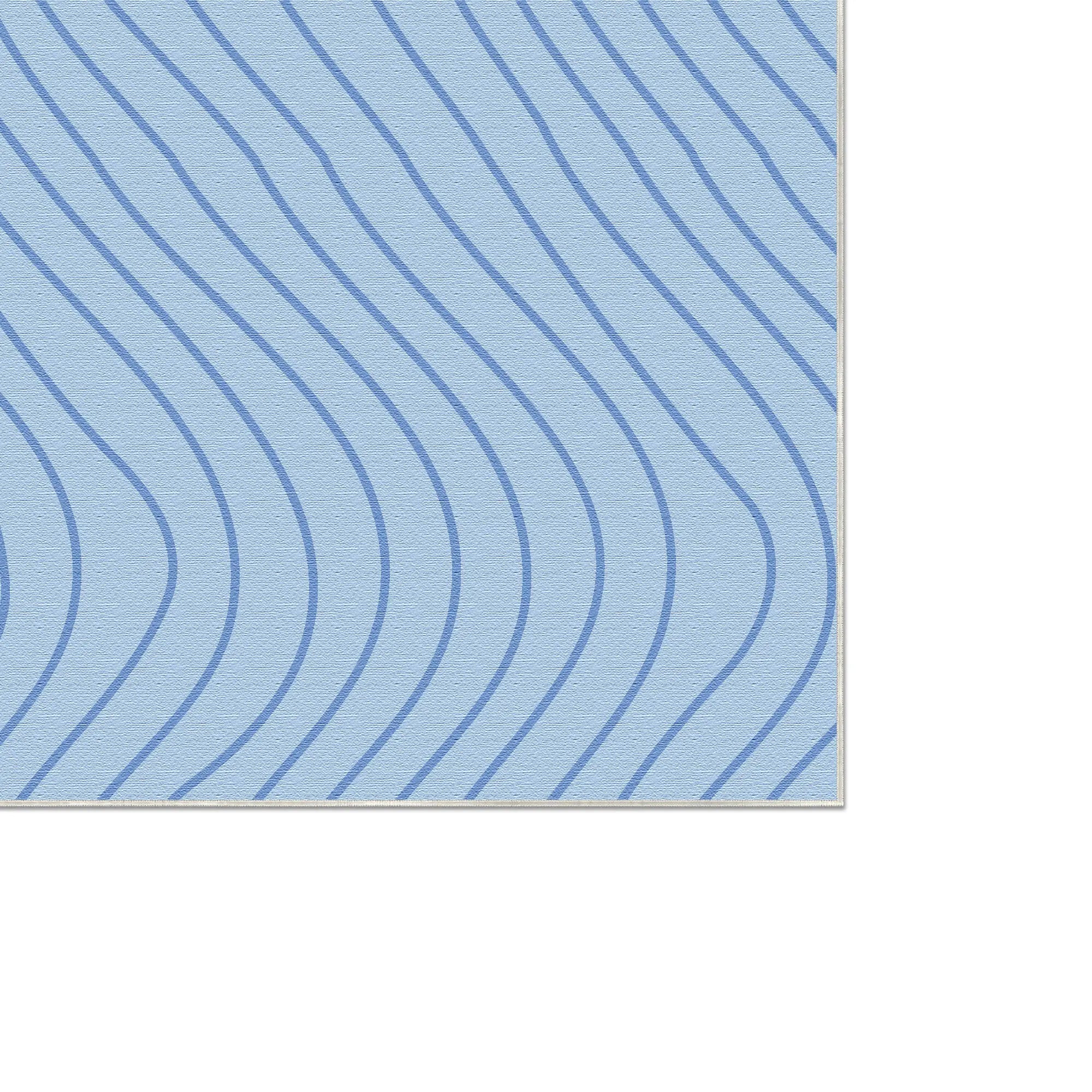 Soft Sky Blue Wavy Motion Accent Rug