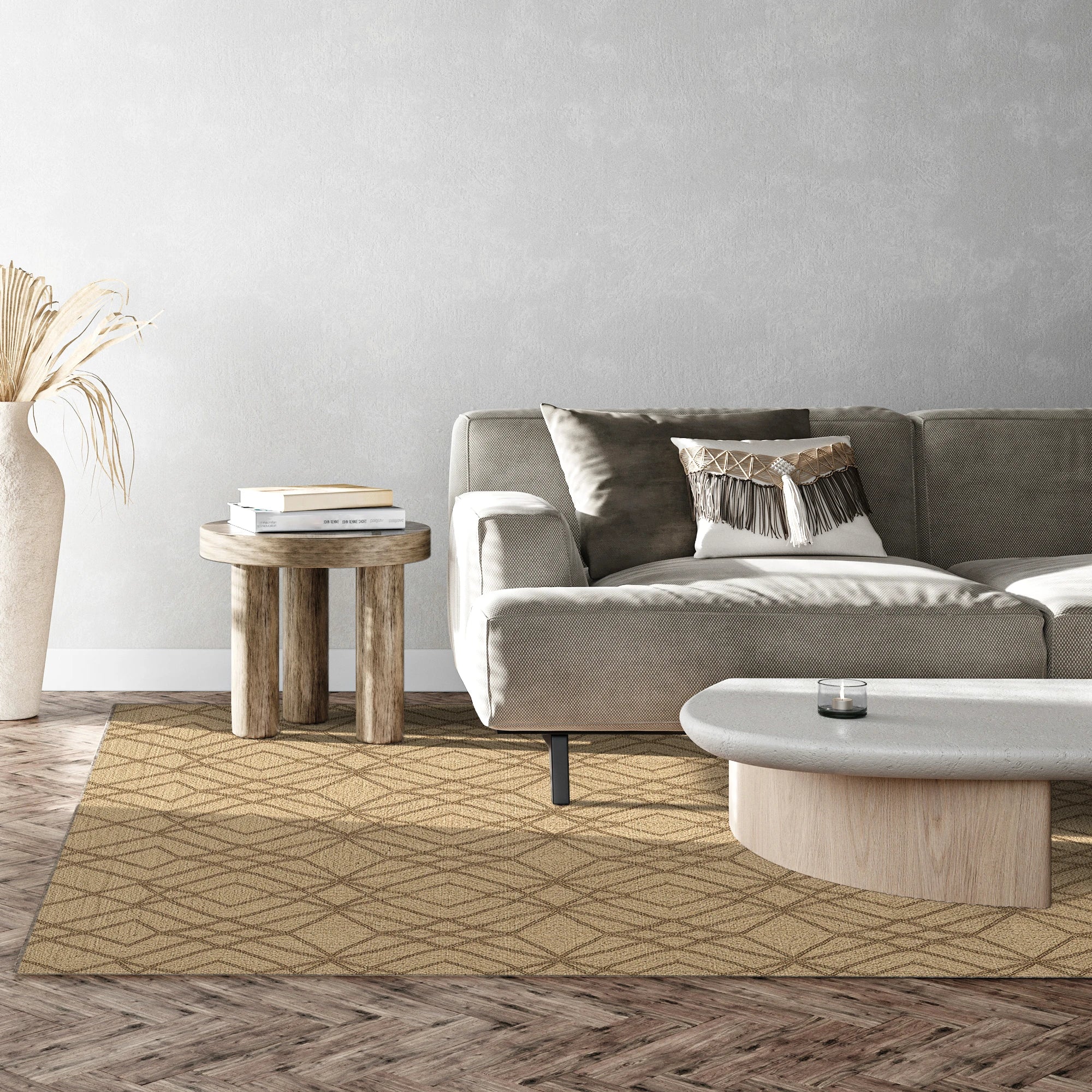 Modern living room with a gray sofa, wooden side table, and patterned rug.