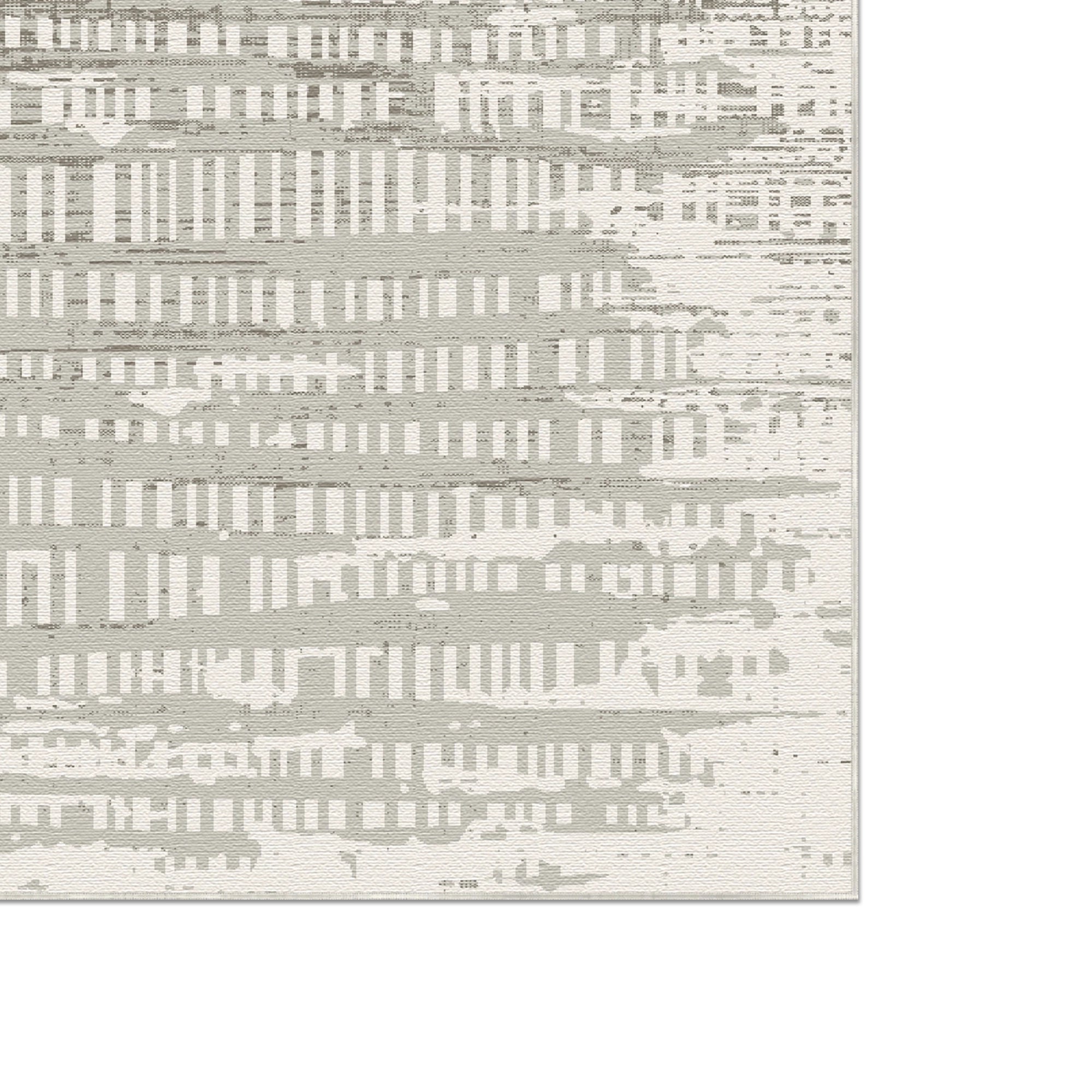 Area rug with digital glitch pattern in shades of gray and off-white